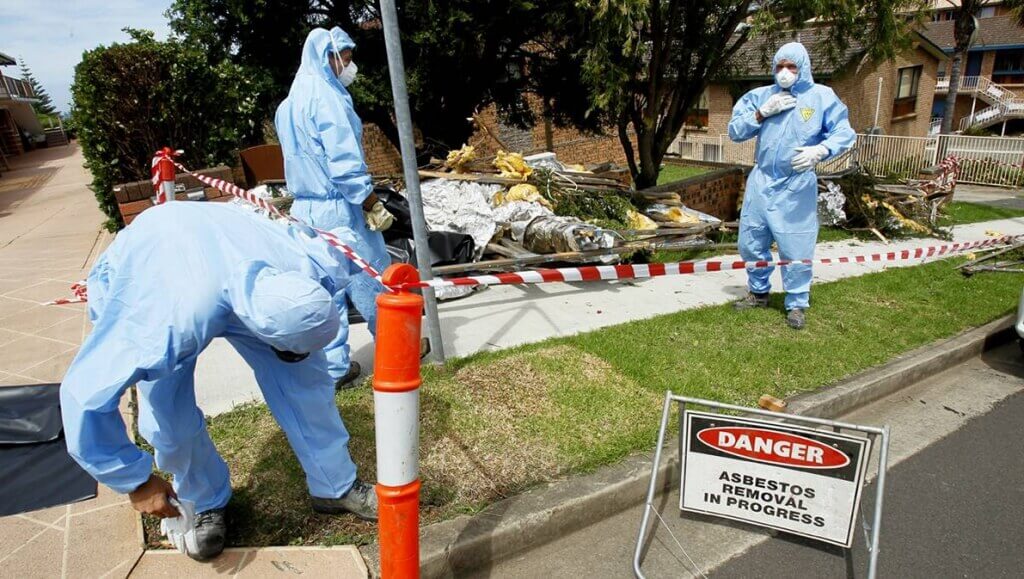 Licensed asbestos removal workers operating safely in London property